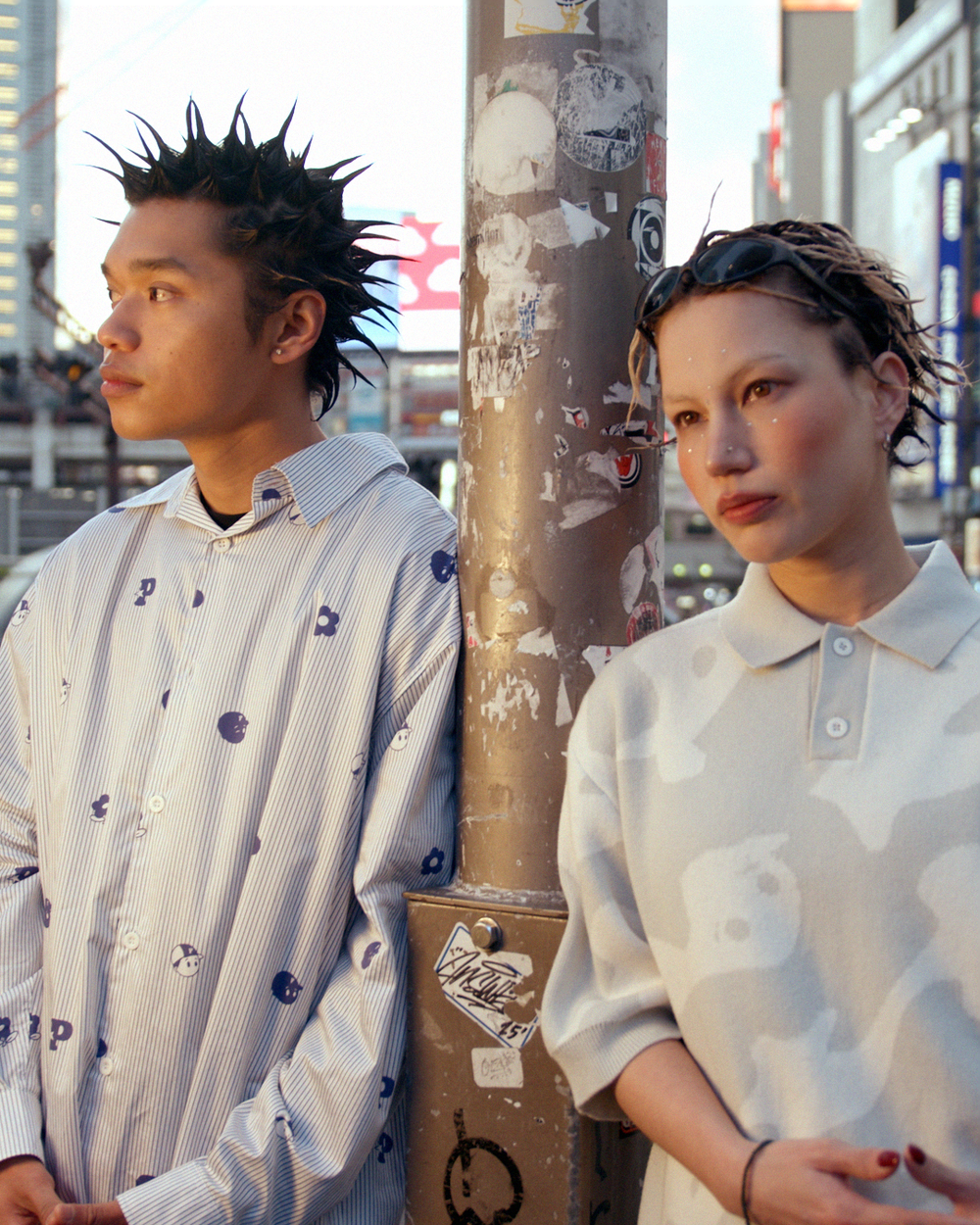 Pawa Speed Sports Monogram Stripe Shirt and Ghost Camo Knit Polo worn on a Tokyo street, Season 5 lookbook
